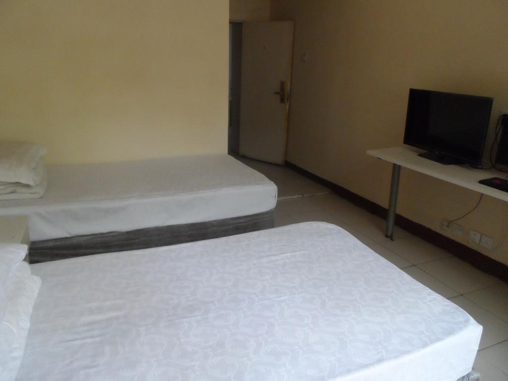 Public Security Bureau Guesthouse Zhengzhou Quarto foto